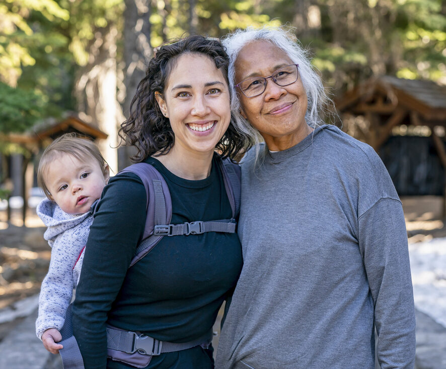 Happy multi-generation family enjoying nature hike